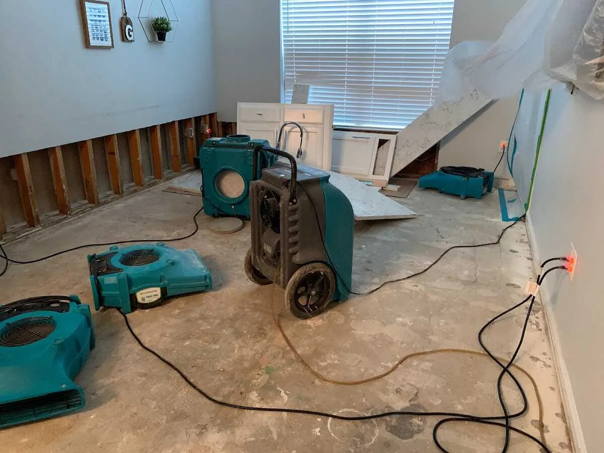 Dehumidifier in flood-cut room for Water Damage Restoration in Pine Hill